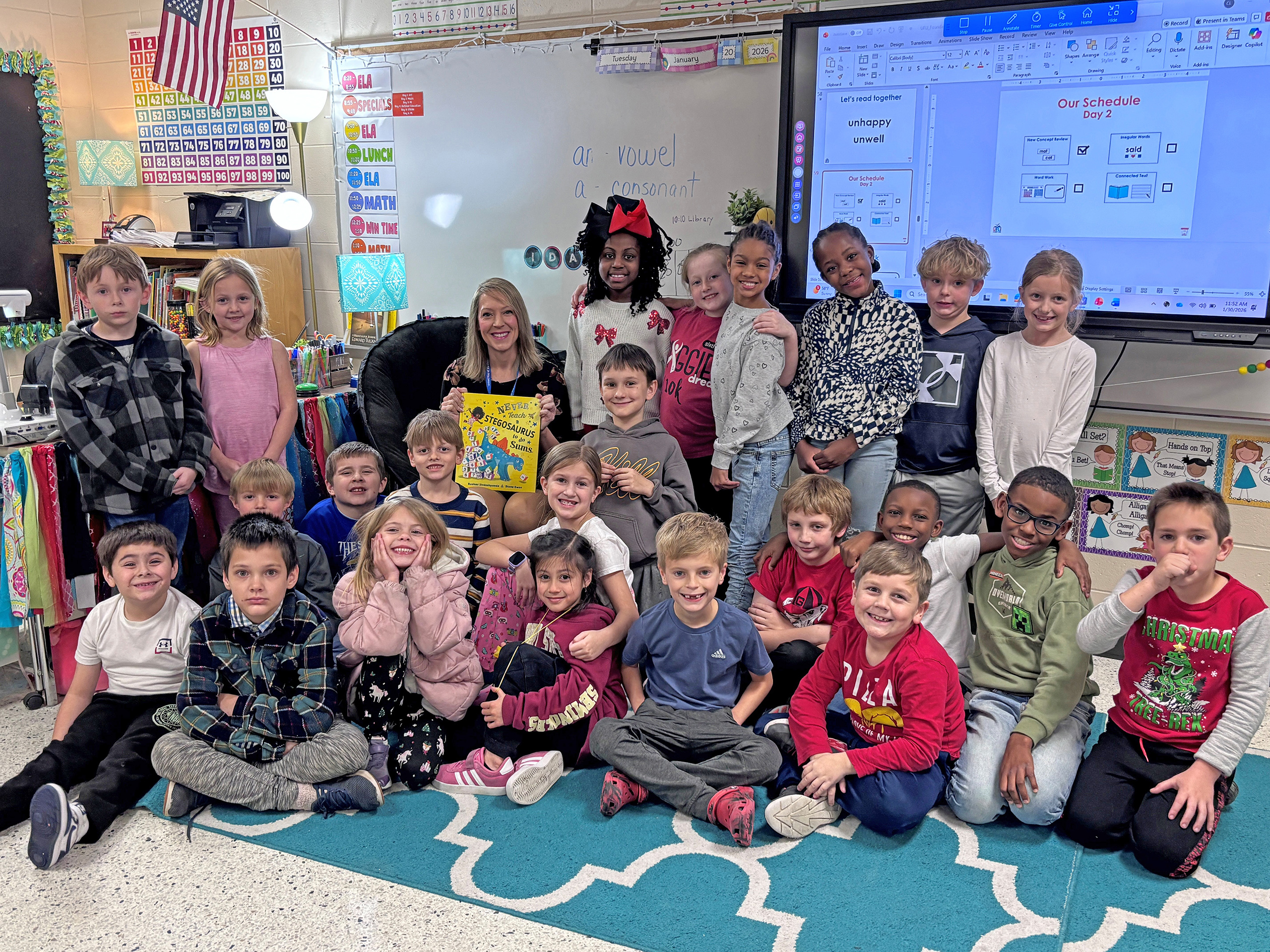WTOC meteorologist Jamie Ertle poses for a photo with a class